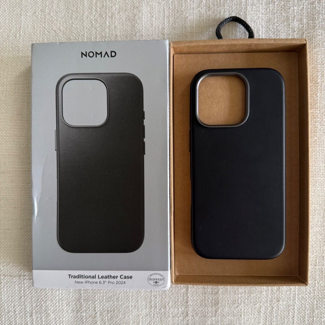 Nomad Horween Traditional Leather Phone Case for iPhone 16 Pro (Category: Cases & Sleeves) located in Singapore. Submitted by wlshr (Listing ID 1454458868, Image 1). Description: - Made with premium vegetable-tanned leather from the USA. - Full wrap leather design for a sleek look. - Tactile aluminum buttons and camera ring for a premium feel. - Compatible with MagSafe and wireless charging. - Original price $120.
