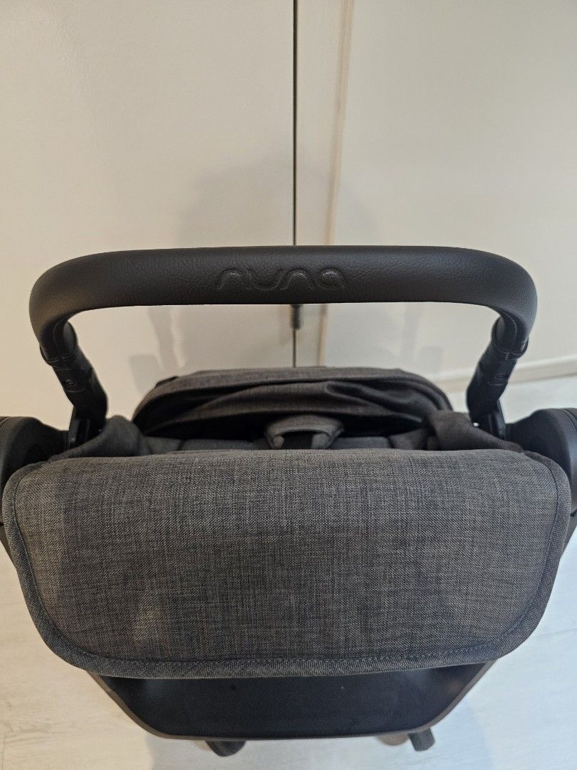 (Super New! 9.9/10) Nuna TRVL LX Stroller - Thunder Grey (with warranty!) (Category: Strollers) located in Singapore. Submitted by bungy99 (Listing ID 1454553695, Image 10). Description: Purchased in April 2026 Baby born in June 2026 started using in Aug 2026 Warranty: 2 years (April 2026 to April 2028) Condition: Like new / Super new condition. Zero signs of wear on wheels (refer to photos to believe it!). Usage: Used only 3 times for short trip