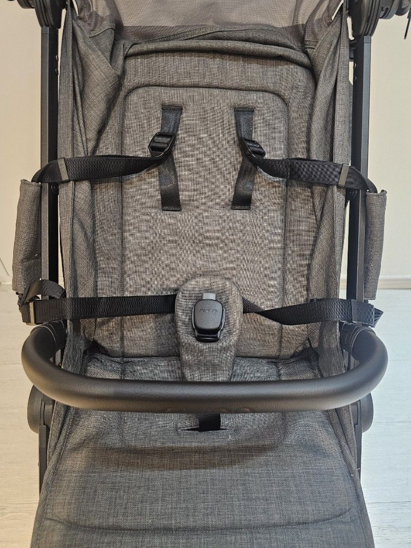 (Super New! 9.9/10) Nuna TRVL LX Stroller - Thunder Grey (with warranty!) (Category: Strollers) located in Singapore. Submitted by bungy99 (Listing ID 1454553695, Image 7). Description: Purchased in April 2026 Baby born in June 2026 started using in Aug 2026 Warranty: 2 years (April 2026 to April 2028) Condition: Like new / Super new condition. Zero signs of wear on wheels (refer to photos to believe it!). Usage: Used only 3 times for short trips
