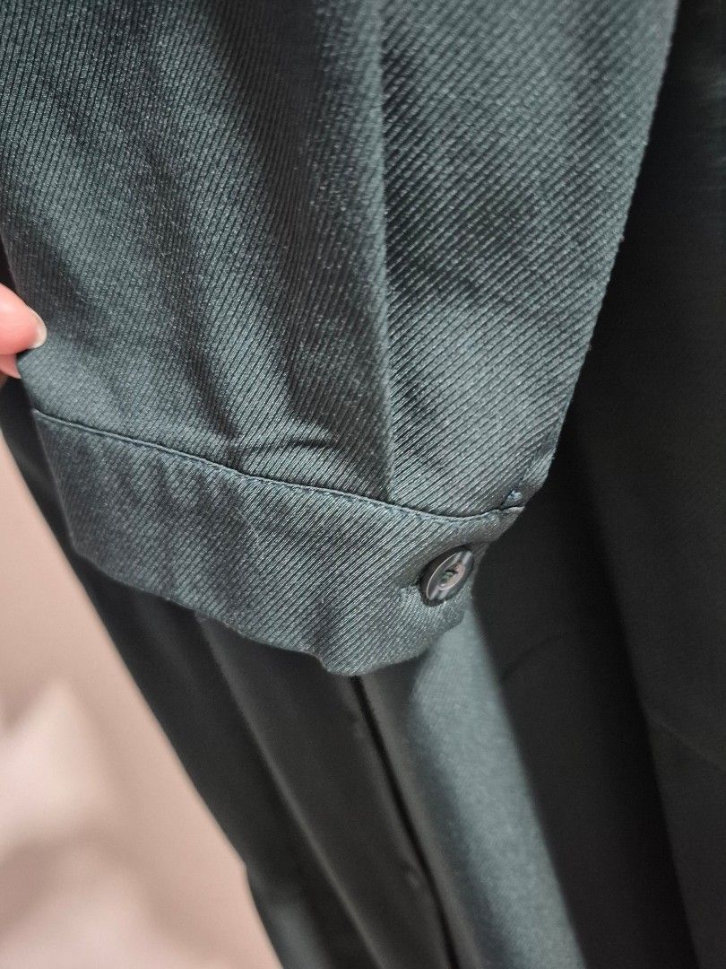Dark Green Button-Up Long top (Category: Longsleeves) located in Singapore. Submitted by hudhud2310 (Listing ID 1454655937, Image 5). Description: - Dark green long-sleeve top - Full button-up front - Two side pockets - Subtle textured weave fabric - Elasticated back waist for comfortable fit - Suitable for casual and semi-formal occasions.