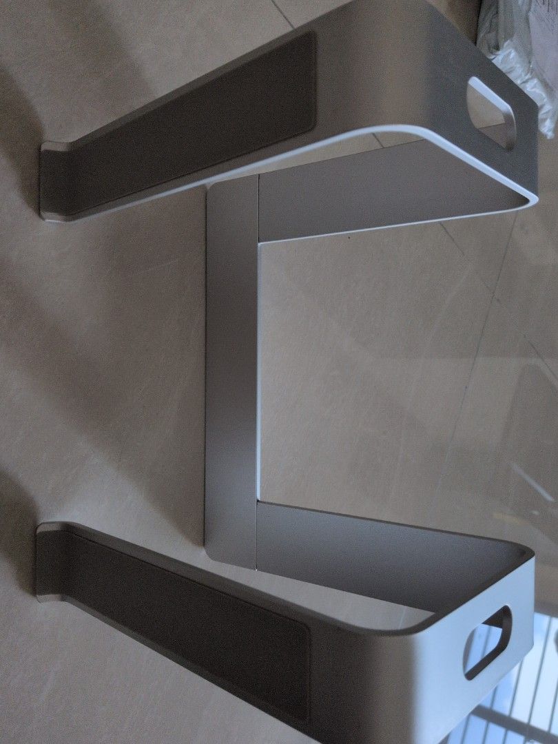 Heavy aluminum Laptop stand (Category: Laptops & Notebooks) located in Singapore. Submitted by luvag (Listing ID 1454579945, Image 2). Description: - Heavy-duty aluminum laptop stand - Sleek and modern design - Provides excellent stability and durability - Features non-slip pads for secure placement - Helps improve ergonomics and airflow for your laptop.