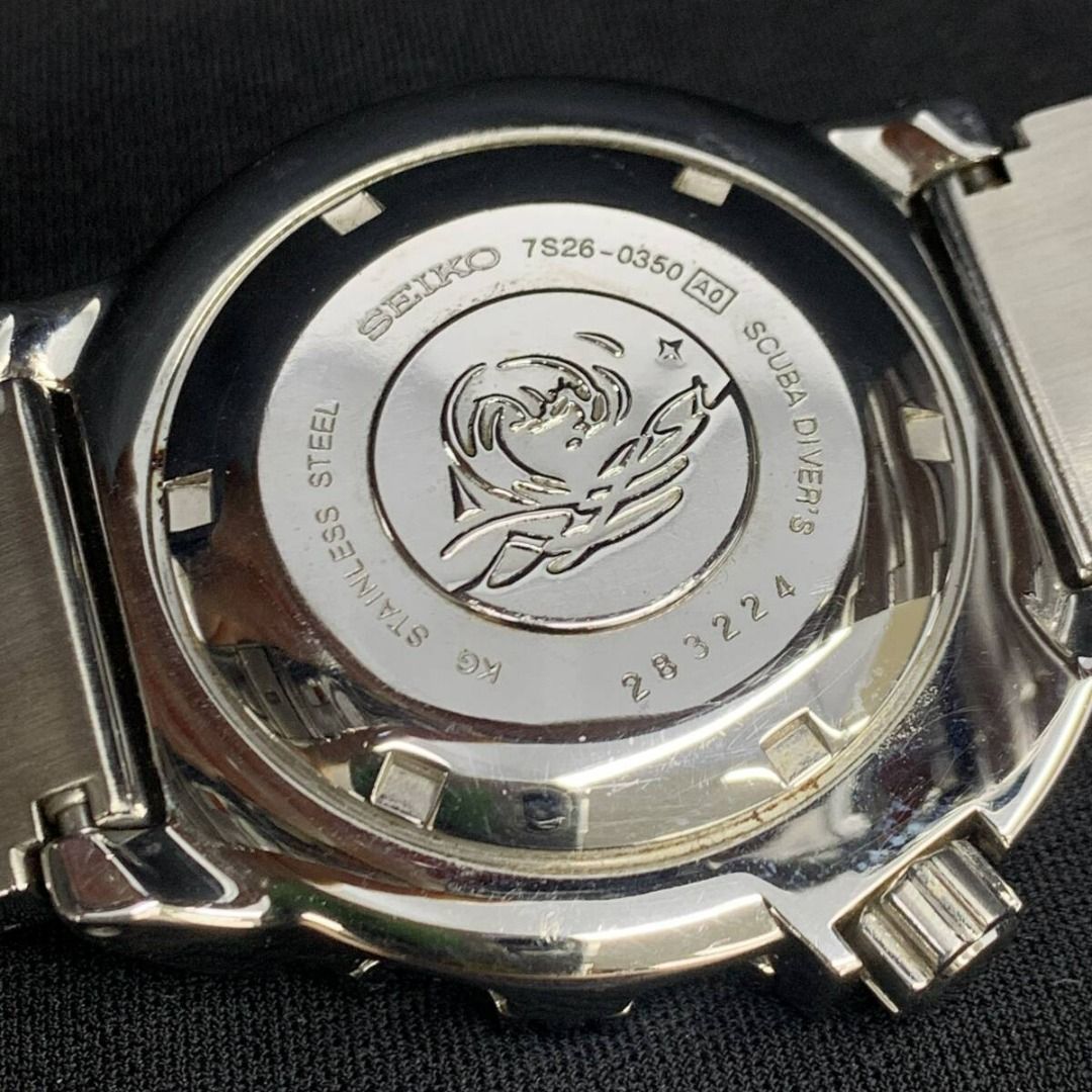 SEIKO Orange Monster Day-Date 7S26-0350 Automatic Stainless Steel Men's Watch with Original Strap, Working Condition Confirmed, As Is. (Category: Men's Watches) located in Singapore. Submitted by letao.sg (Listing ID 1458951036, Image 2). Description: [Manufacturer] SEIKO [Model Name] Orange Monster Day-Date [Model Number/Serial Number] 7S26-0350 [Type] Men's [Case Size] Approx. 40mm (excluding crown) [Type] Automatic Winding [Material] Stainless