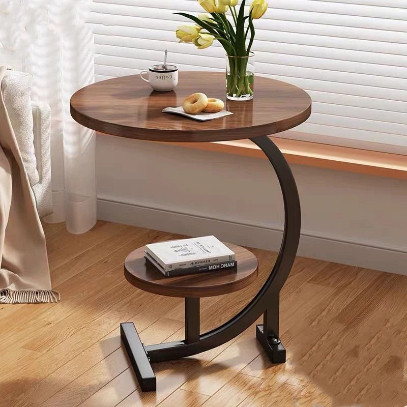 Modern Small Coffee Round Table | Double Layer Storage Tea Table | Space Saving Sofa Side Table | Bedside Bedroom Nightstand | Curved Frame Accent Table | Lightweight Round Table | Home Living Room End Table (Category: Tables & Sets) located in Singapore. Submitted by homehavensg (Listing ID 1459609421, Image 2). Description: Enhance your living space with this versatile C-shaped round side table, thoughtfully designed to bring style, convenience