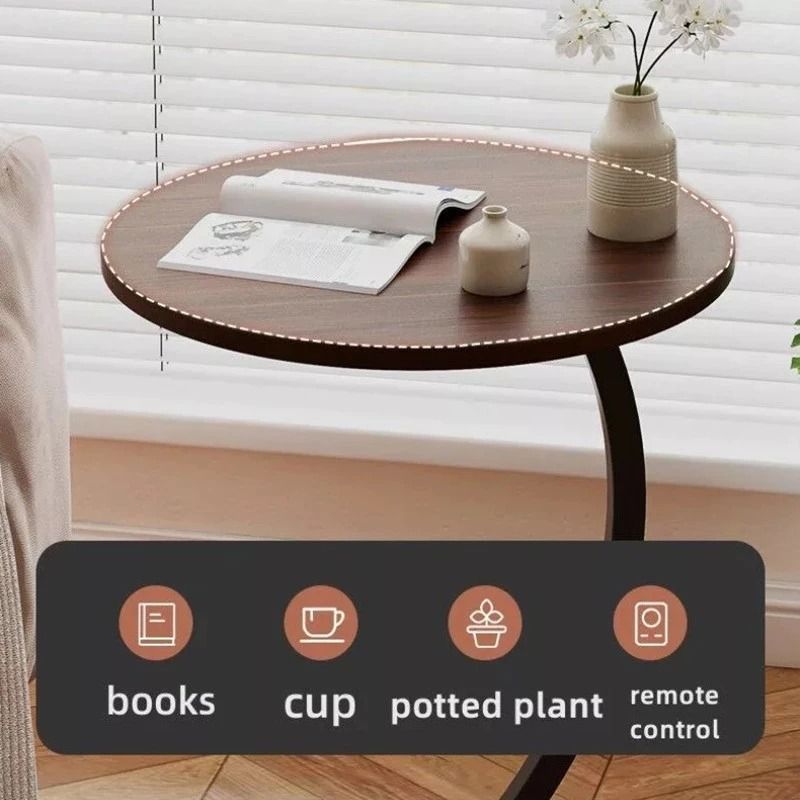 Modern Small Coffee Round Table | Double Layer Storage Tea Table | Space Saving Sofa Side Table | Bedside Bedroom Nightstand | Curved Frame Accent Table | Lightweight Round Table | Home Living Room End Table (Category: Tables & Sets) located in Singapore. Submitted by homehavensg (Listing ID 1459609421, Image 8). Description: Enhance your living space with this versatile C-shaped round side table, thoughtfully designed to bring style, convenience