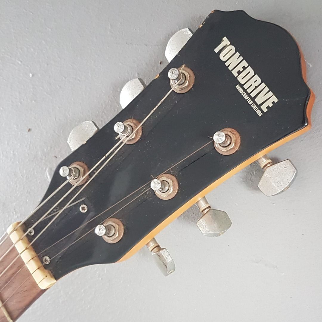 Retro Gloss Black Electric Guitar, Tone Drive Handcrafted Guitar, SVGUITARS, Legendary Les Paul Studio Design, Cosmopolitan, Dual Humbucker Pickups, Four-Control Layout, One String Broken, To Re-string, DIY Project, Cool Showpiece (Category: Musical Instruments) located in Singapore. Submitted by warehouseno5 (Listing ID 1459904083, Image 8). Description: Retro Gloss Black Electric Guitar, Tone Drive Handcrafted Guitar, SVGUITARS, Legendary Les P