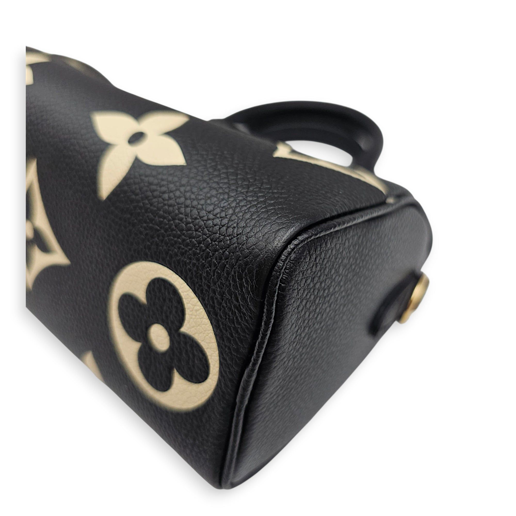 Louis Vuitton Bandouliere Speedy Nano Black Crossbody Bag in Monogram Empreinte Leather Gold hardware (Category: Bags & Wallets) located in Singapore. Submitted by luxlexicon (Listing ID 1460287507, Image 8). Description: SKU CL2607-22672 Material Monogram Empreinte Leather Size Nano Color Black Hardware Gold Strap Included, Detachable Accessories Dust Bag, Box, Series - Circa Est NA Condition - Overall: Like New Condition - Zippers / Hardware: S